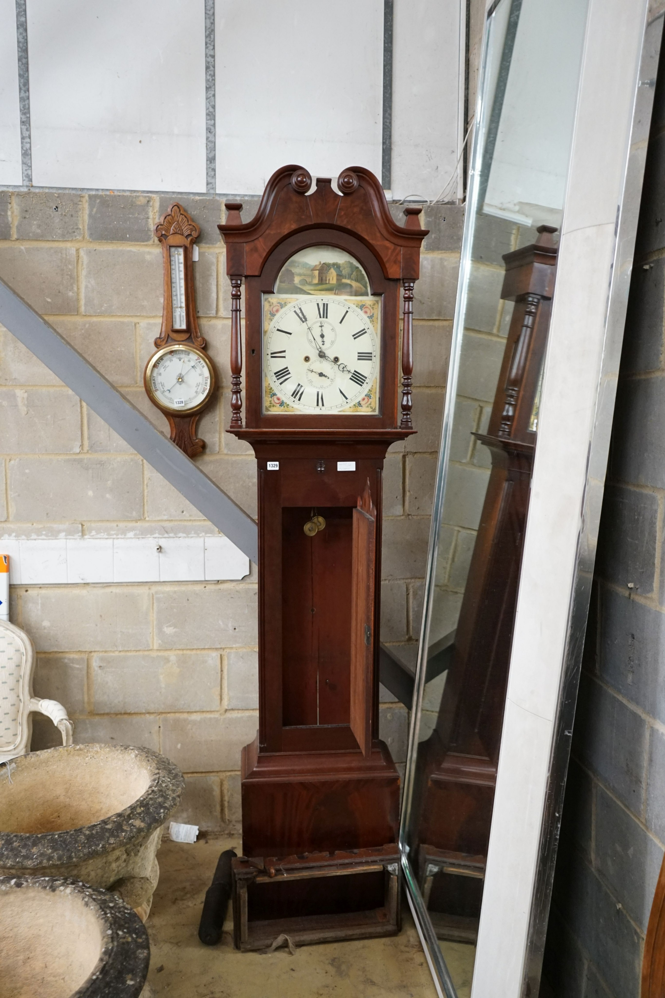 A 19th century mahogany 8 day longcase clock with painted dial, height 214cm